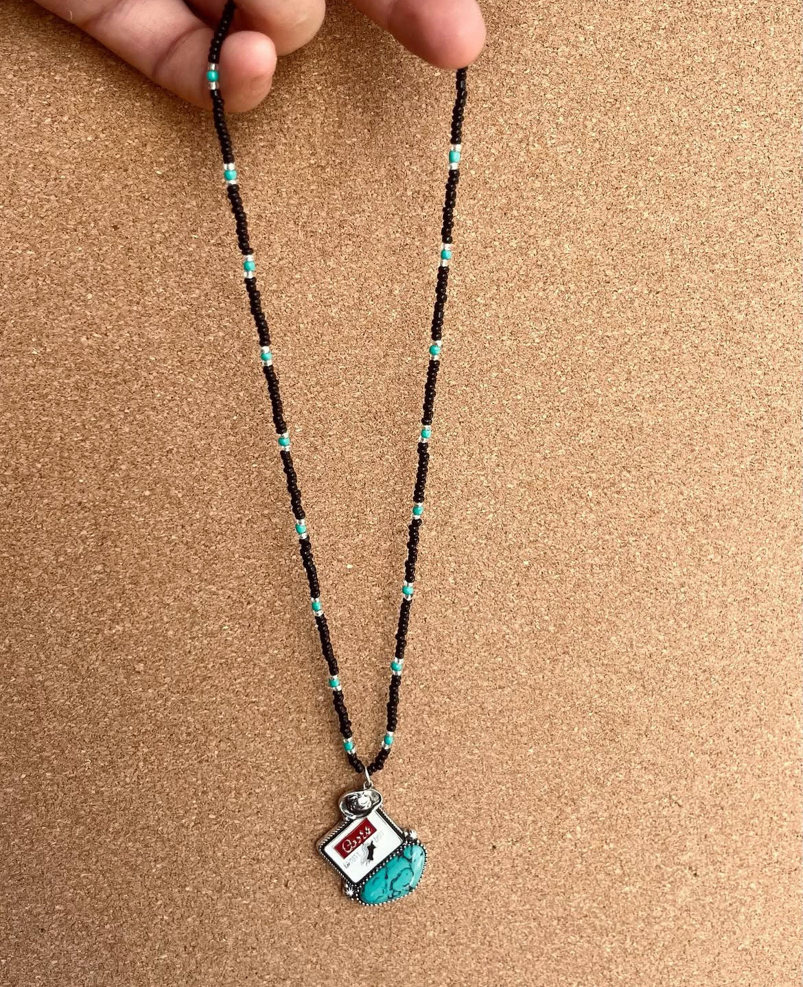 Black and Turquoise Necklace with Coors Pendant