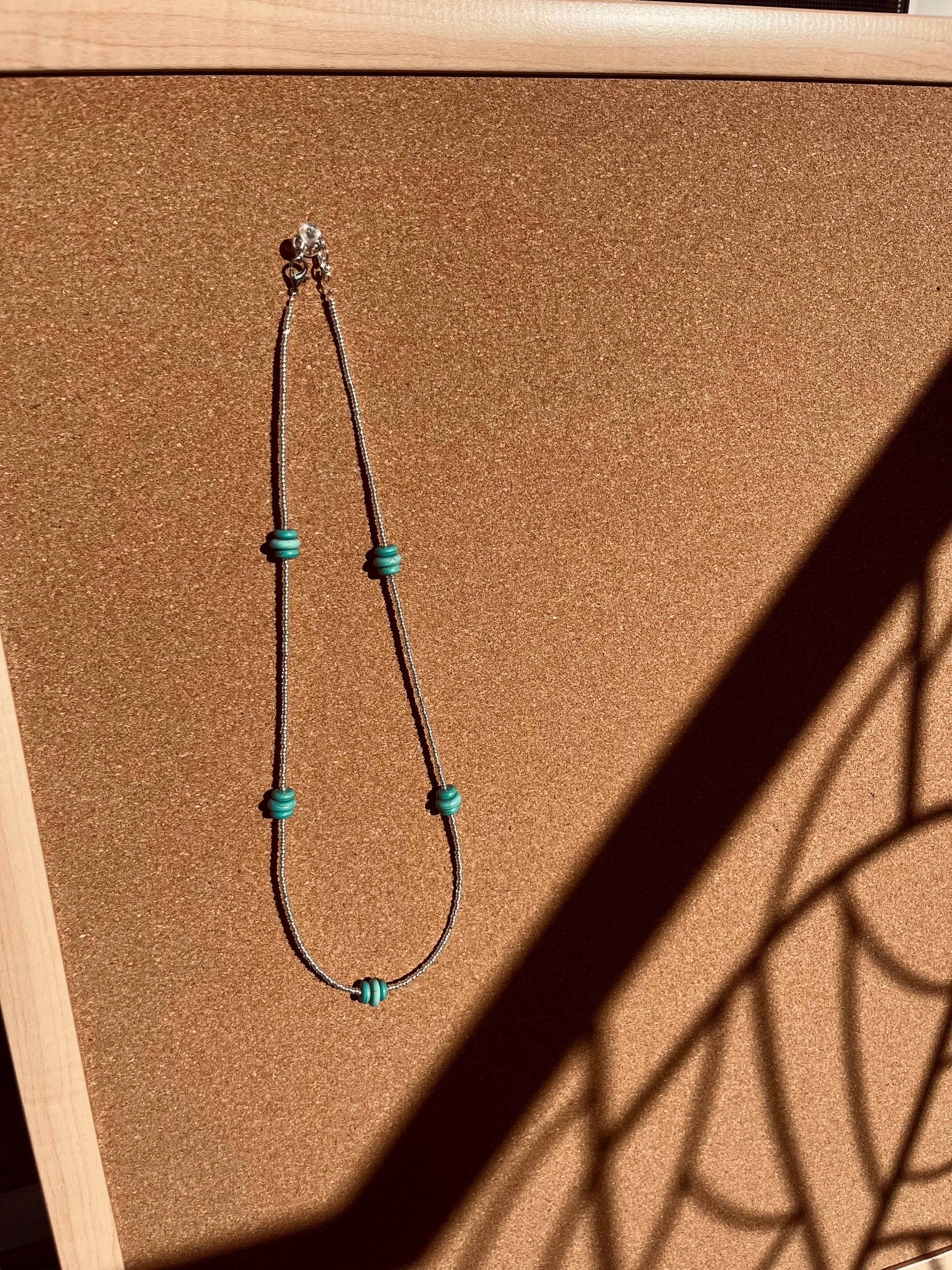 Long Silver Necklace with Turquoise Accents